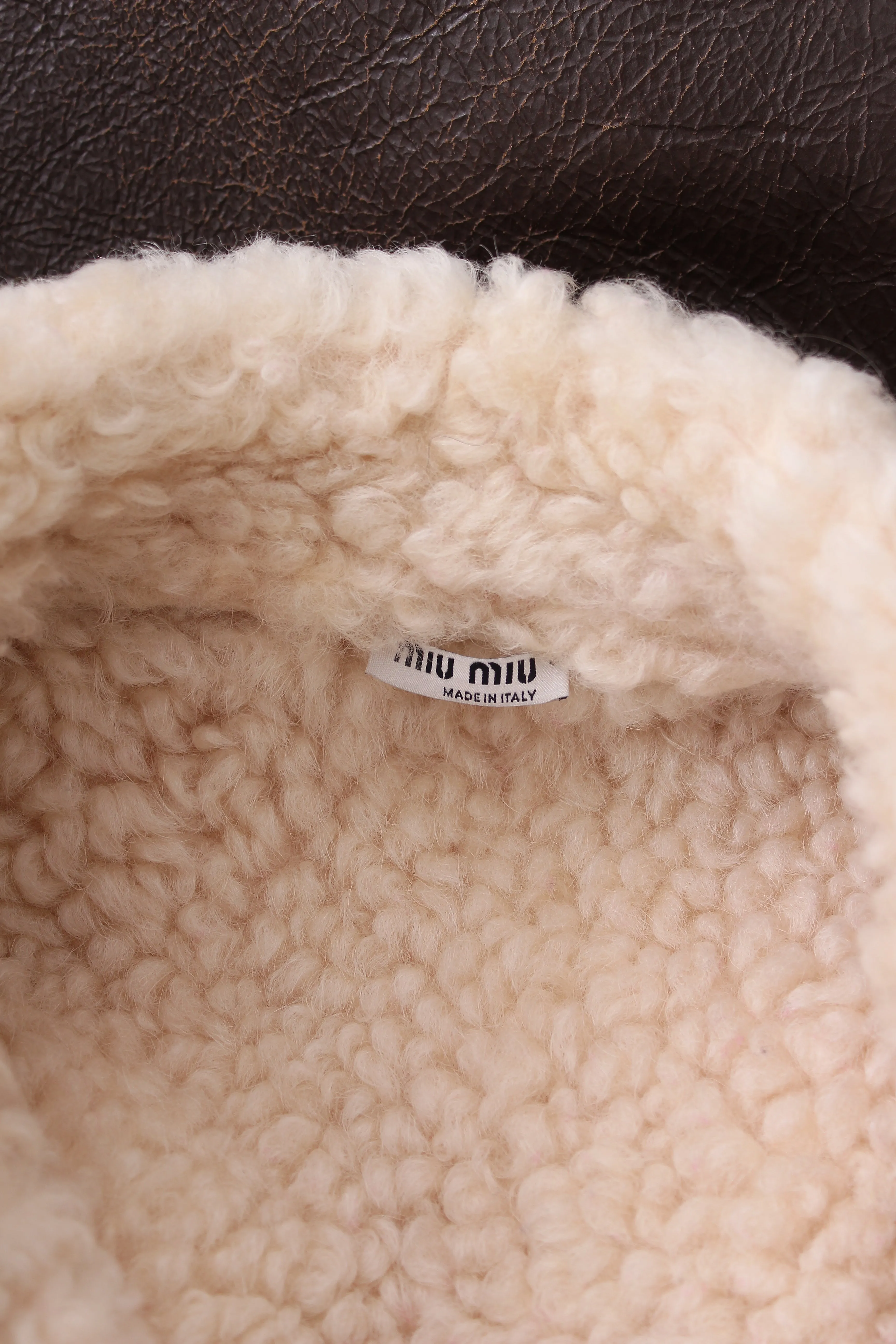 Miu Miu Distressed Sheepskin Logo Coat